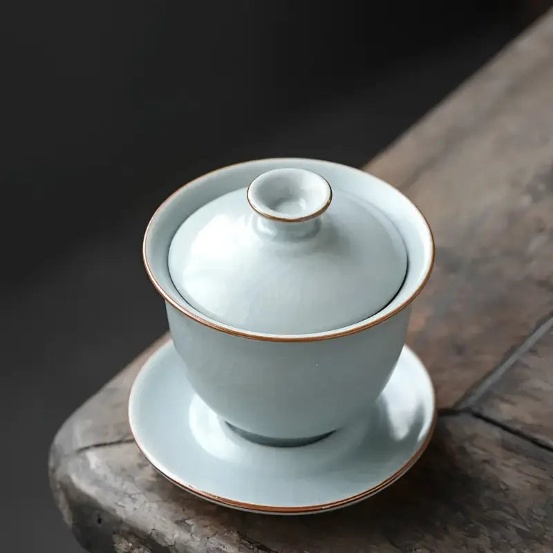 Light blue ceramic kiln gaiwan with crackle glaze for authentic gongfu tea brewing