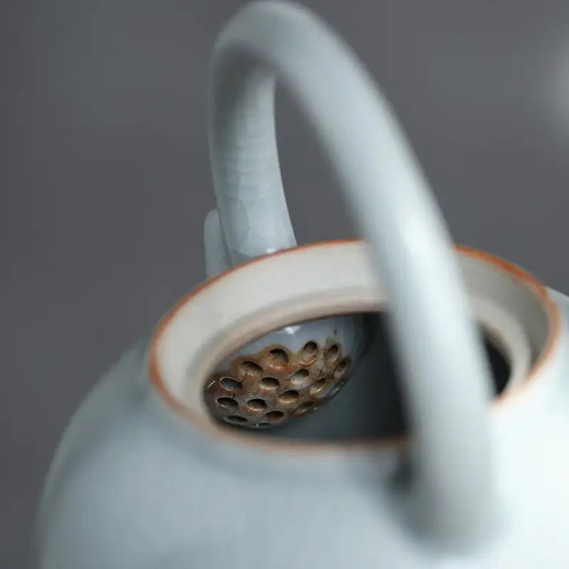 Blue Celadon Ru Kiln crackle glaze teapot with strainer showcasing Tianqing glaze