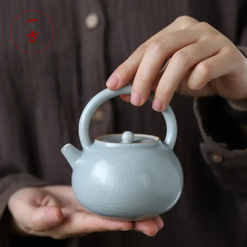 Pale blue Celadon Ru Kiln crackle glaze teapot with tianqing glaze design