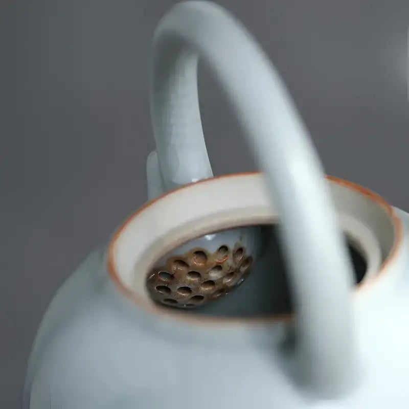 Blue Celadon Ru Kiln crackle glaze teapot with strainer showcasing Tianqing glaze