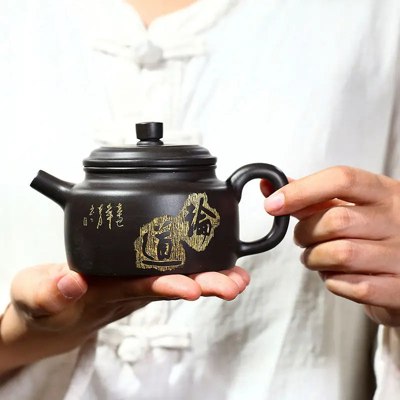Black ceramic Celestial Script Yixing Zisha Teapot with Gold Lettering