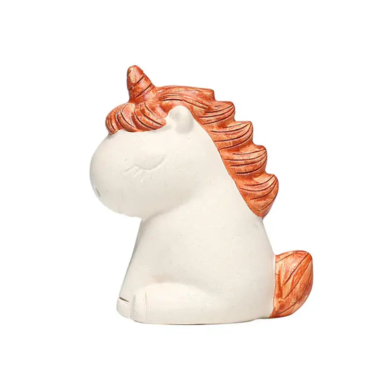 Ceramic Celestial Unicorn figurine with closed eyes, ideal for Feng Shui energy and tea pets guide