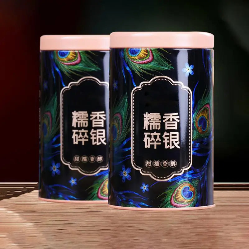 Two cylindrical tea containers for Cha Hua Shi Pu’er Tea Leaves, ideal for tea sets