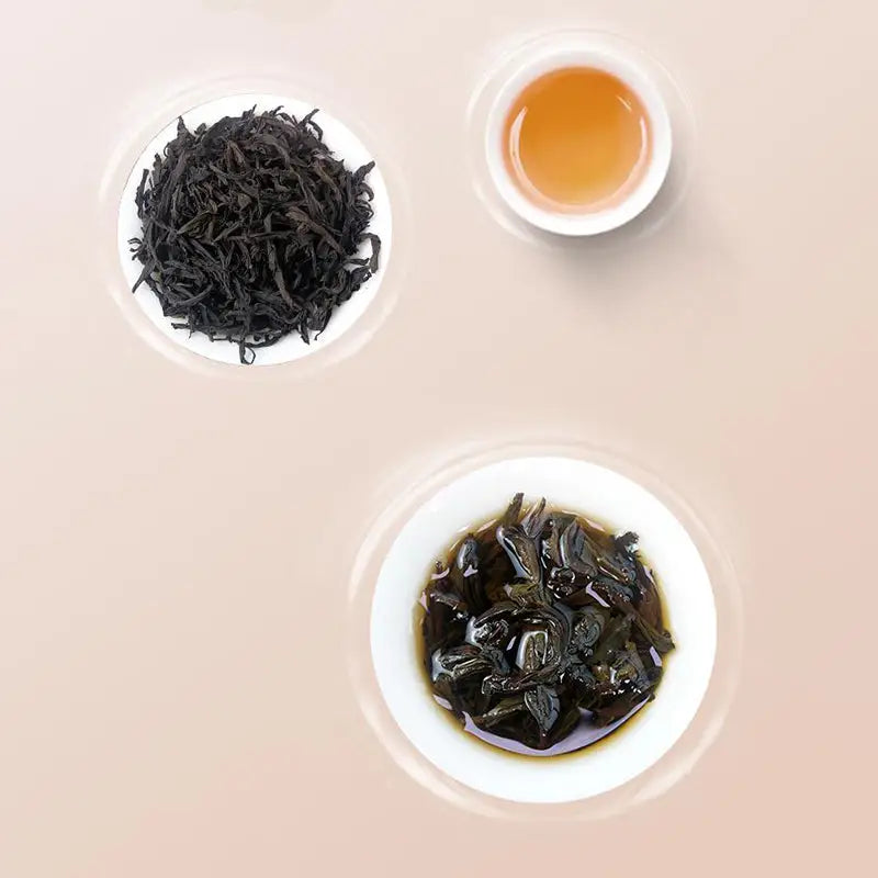 Cinna Mon Rock Tea Leaves and Brewed Tea with Teapots and Mugs in a tea set