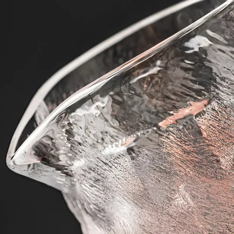 Textured clear glass pitcher for handcrafted Gongfu tea with cloud mist textured design