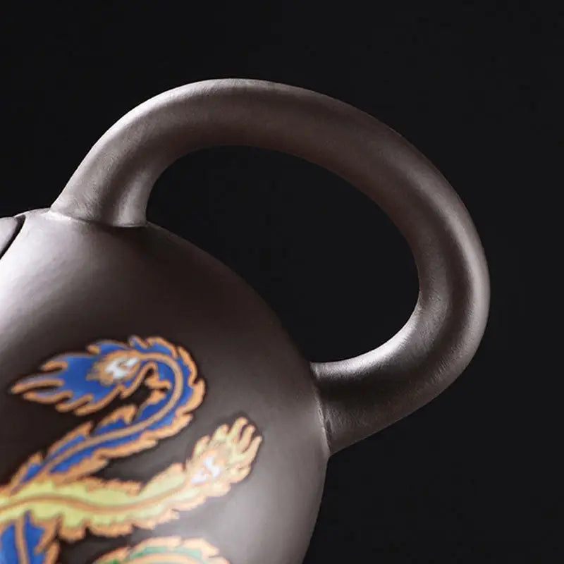 Brown Zisha teapot with color-changing dragon and phoenix Yixing teapot design
