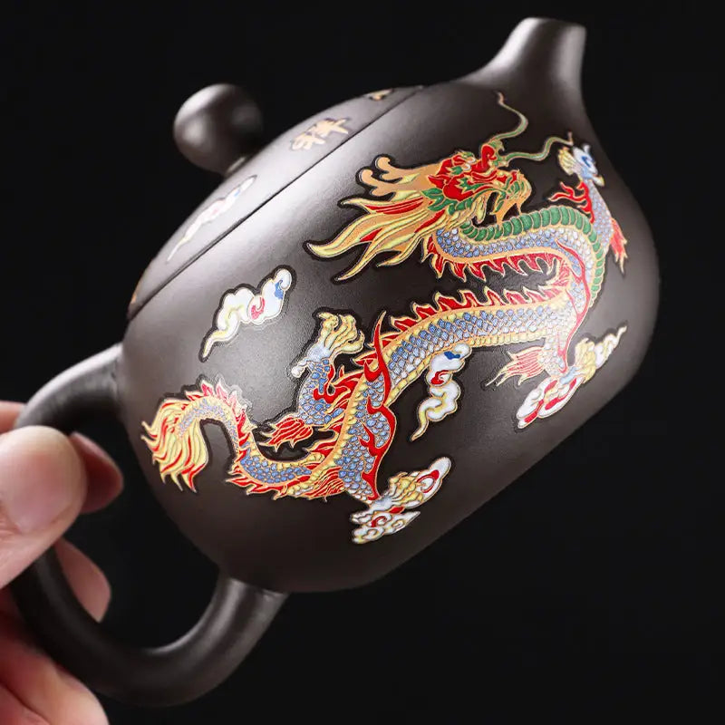 Brown Zisha teapot with colorful color-changing dragon and phoenix design
