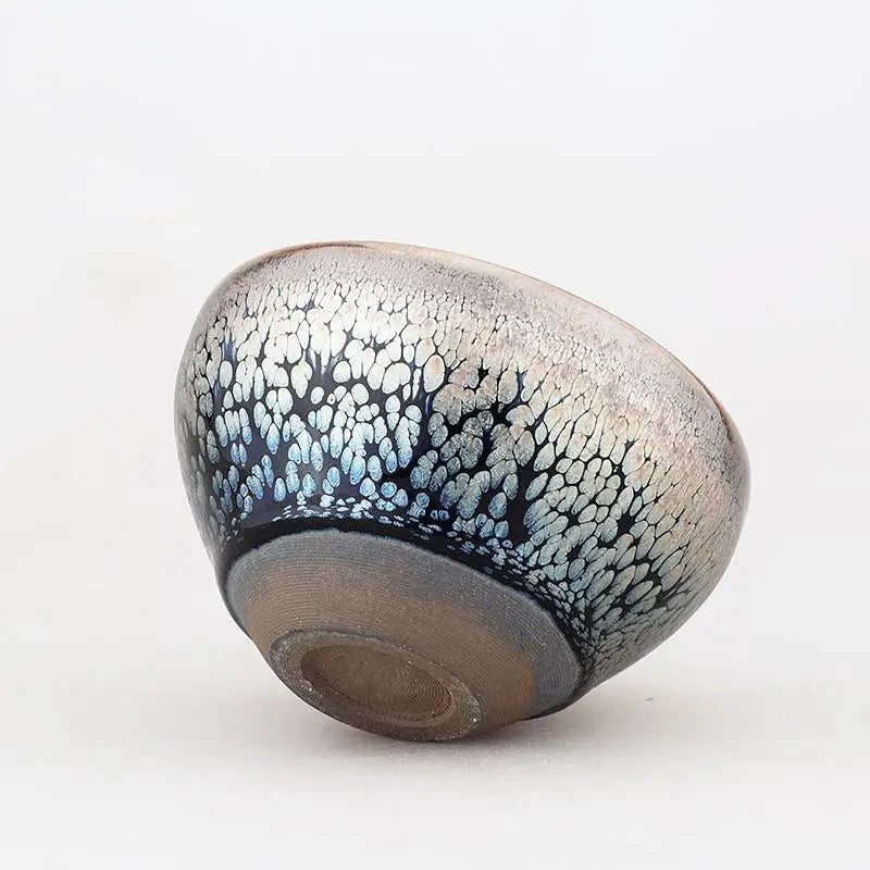 Iridescent textured ceramic bowl from Copperfield Jian with Tenmoku glaze crackle finish