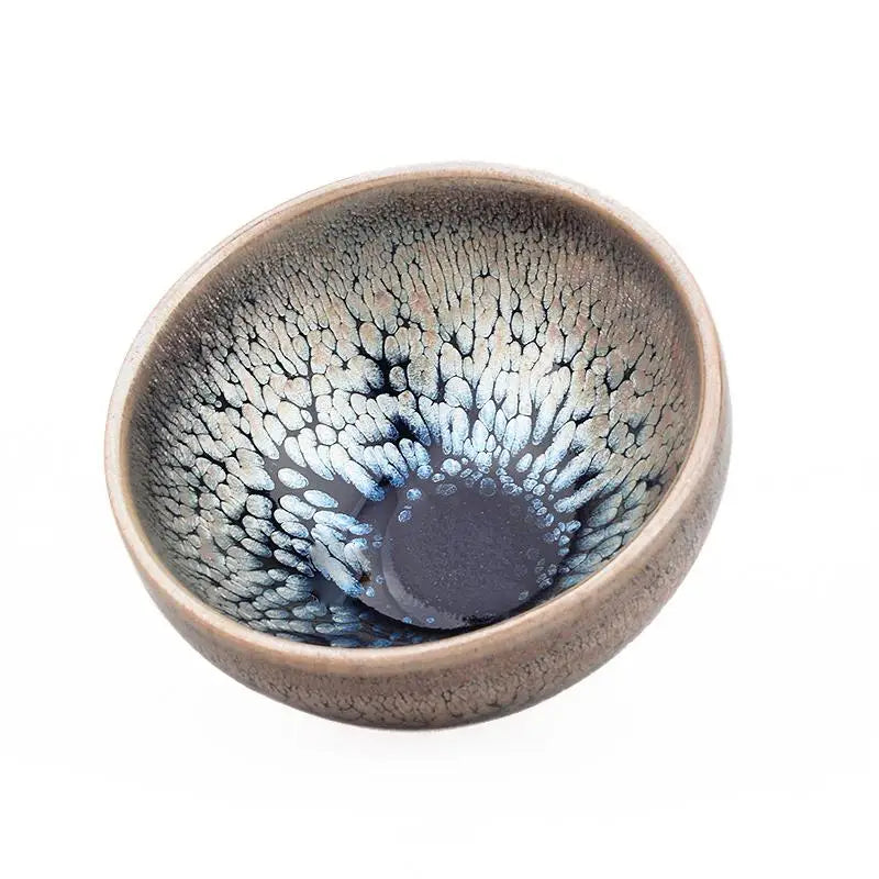 Ceramic bowl with mottled glaze from Copperfield Jian featuring tenmoku glaze crackle