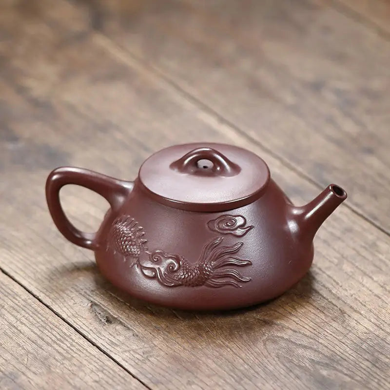Maroon Creative Dragon Yixing Zisha Teapot with intricate dragon design