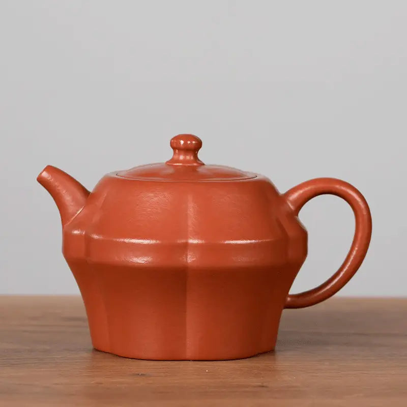Octagonal terracotta teapot from Crimson Harmony Tea Set made of Yixing Zisha clay
