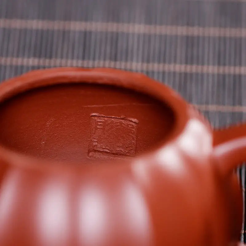 Reddish-brown Yixing Zisha interior of Crimson Harvest Zisha Teapot