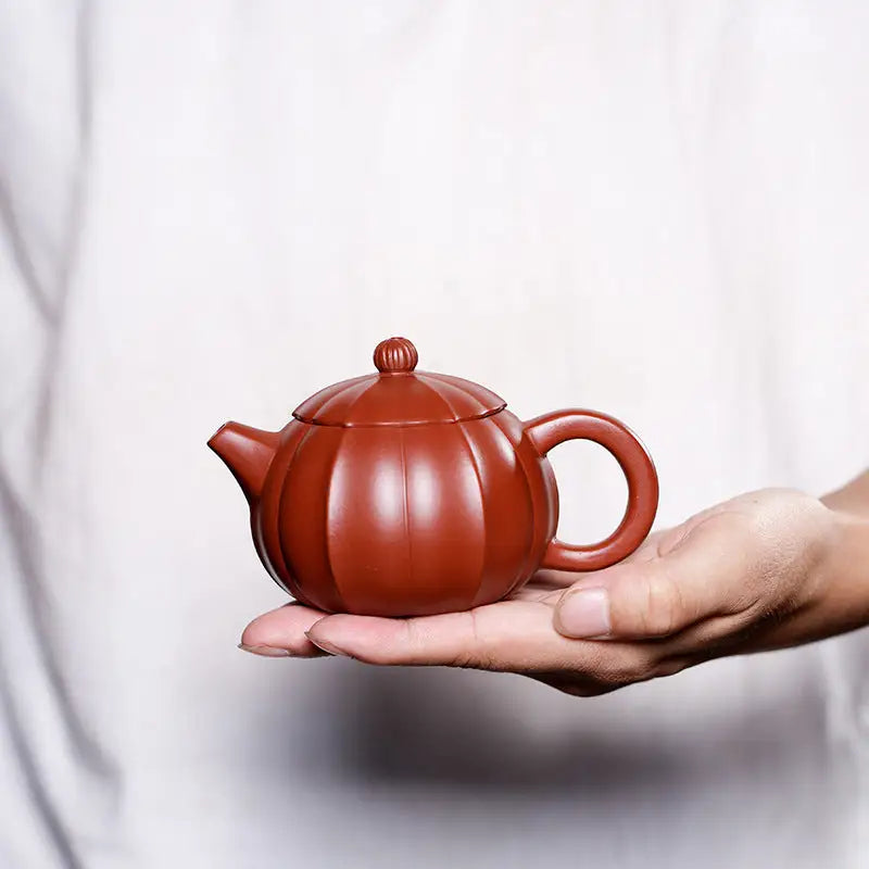 Red-brown pumpkin-shaped Yixing Zisha teapot from Crimson Harvest for tea lovers