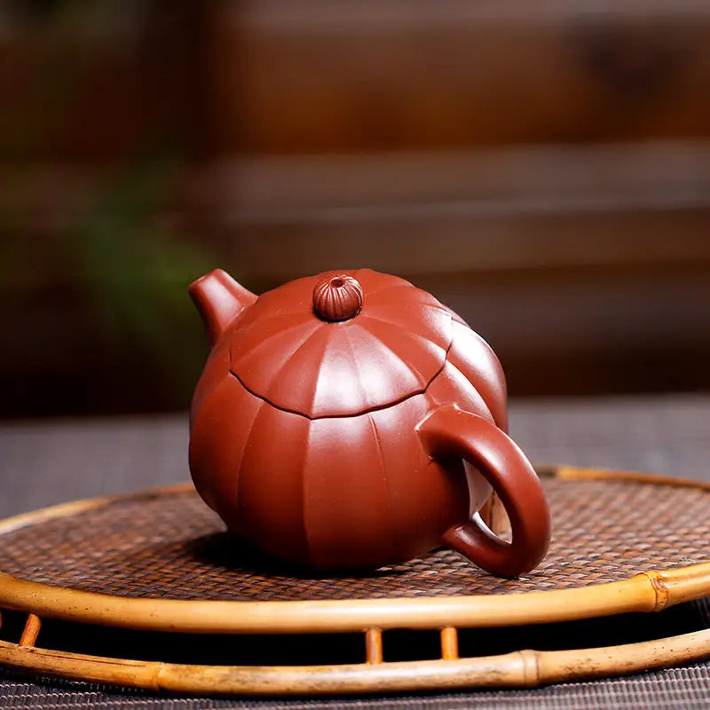Reddish-brown pumpkin-shaped Zisha teapot from Crimson Harvest, perfect for Yixing Zisha brewing