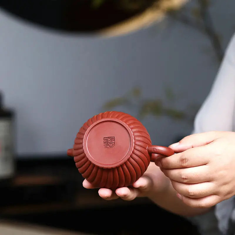 Reddish-brown ribbed Yixing Zisha teapot from Crimson Spiral Harmony Handmade Yixing