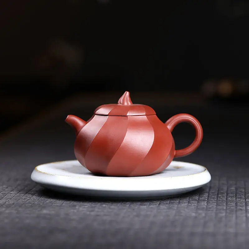 Red-brown Yixing Zisha teapot with ridged design for Crimson Spiral Gongfu brewing