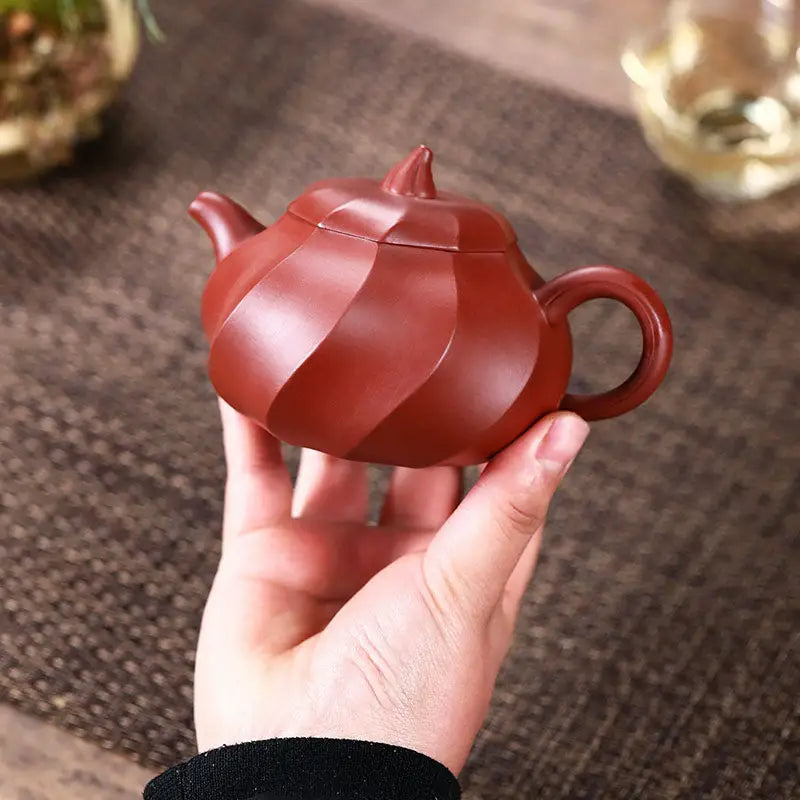 Red-brown Yixing Zisha Teapot with spiral design for Crimson Spiral Gongfu Brewing