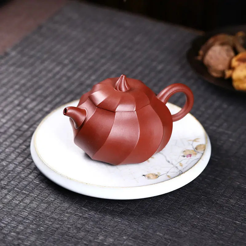 Red-brown ridged Yixing Zisha teapot for Gongfu brewing in the Crimson Spiral collection