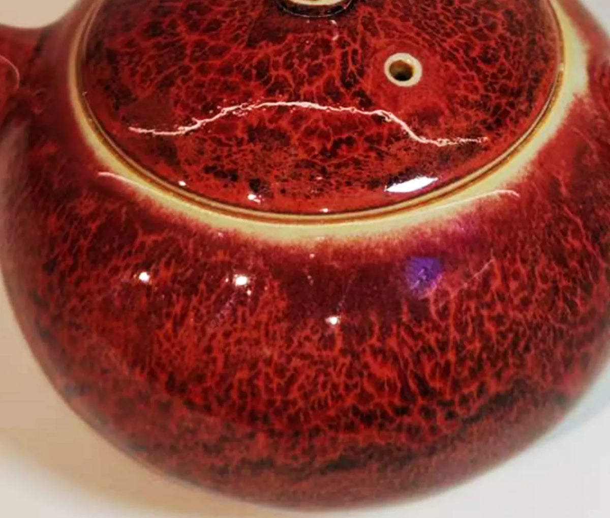 Crimson Xishi Jun Teapot — glaze close-up