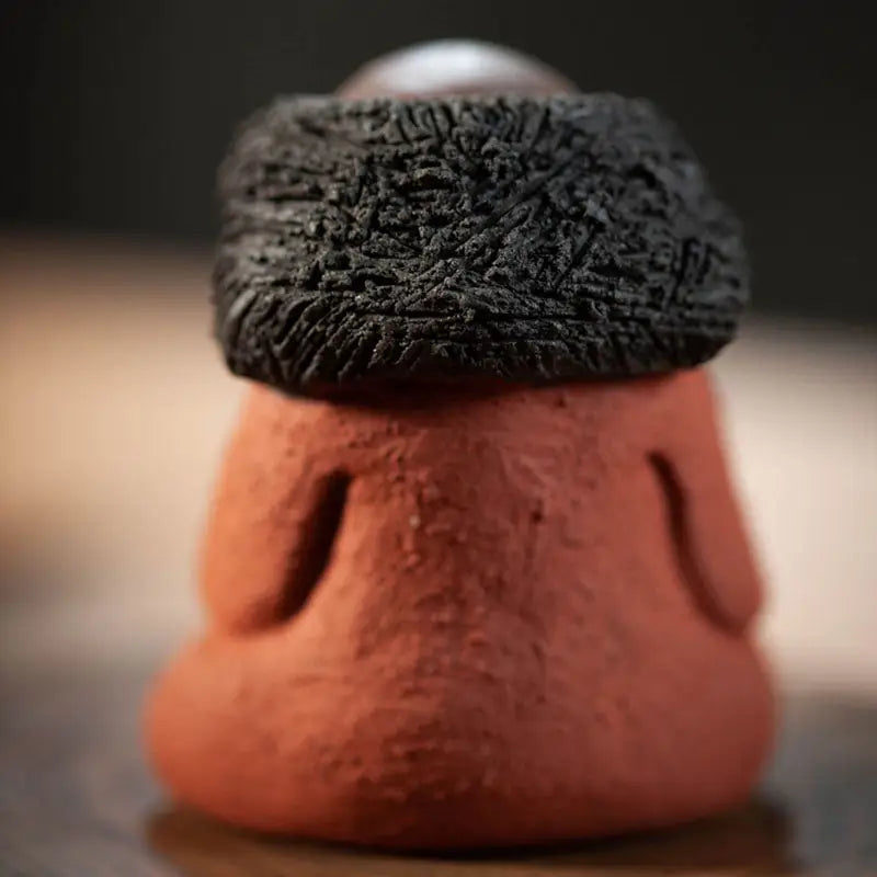 Terracotta Dhyana Guardian Zisha Tea Pet with black fur hat for authentic Yixing Zisha crafts
