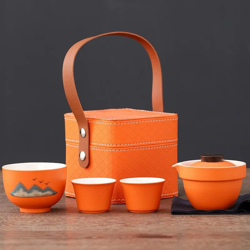 Orange ceramic kuaike travel tea set with host cup, cups and square leather-strap bag – photo 1