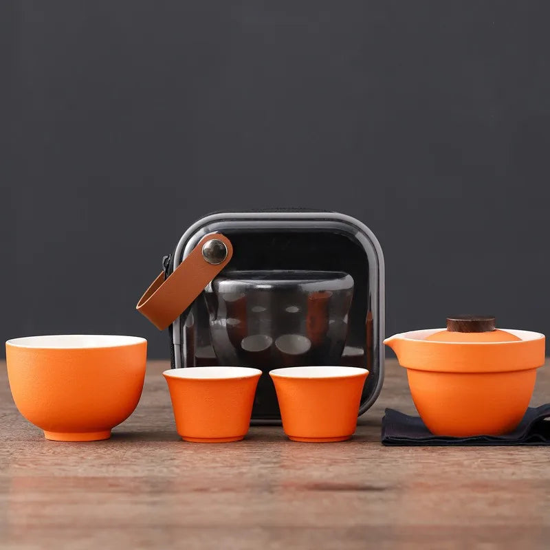 Orange ceramic kuaike travel tea set with host cup, cups and square leather-strap bag – photo 2