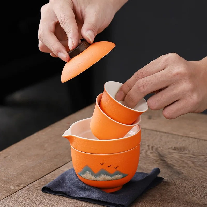 Orange ceramic kuaike travel tea set with host cup, cups and square leather-strap bag – photo 4