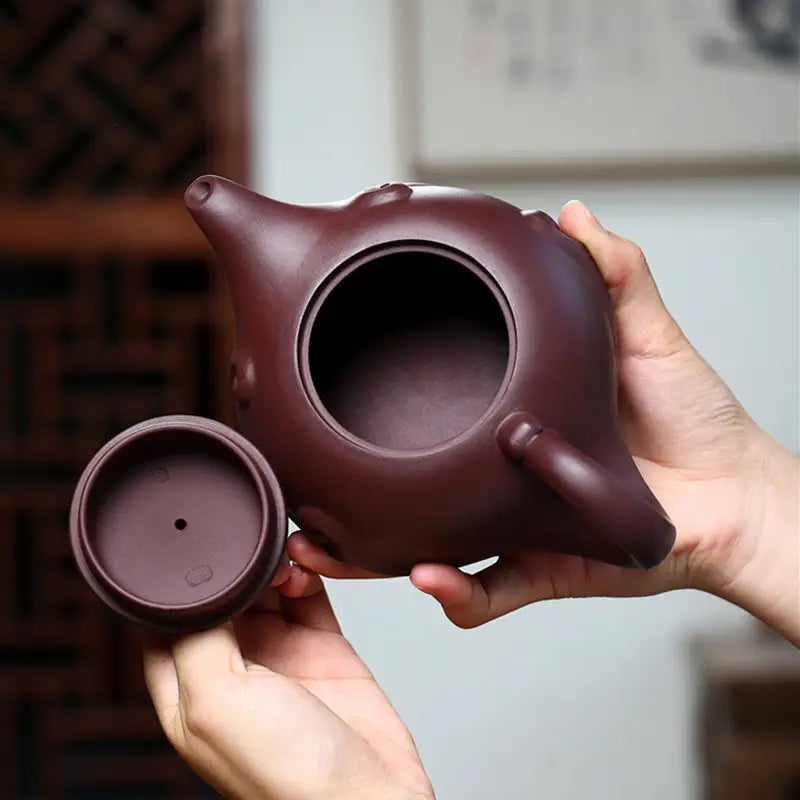 Maroon clay Dragon Crest teapot with lid showcasing sculpted dragon design, 220ml Yixing Zisha