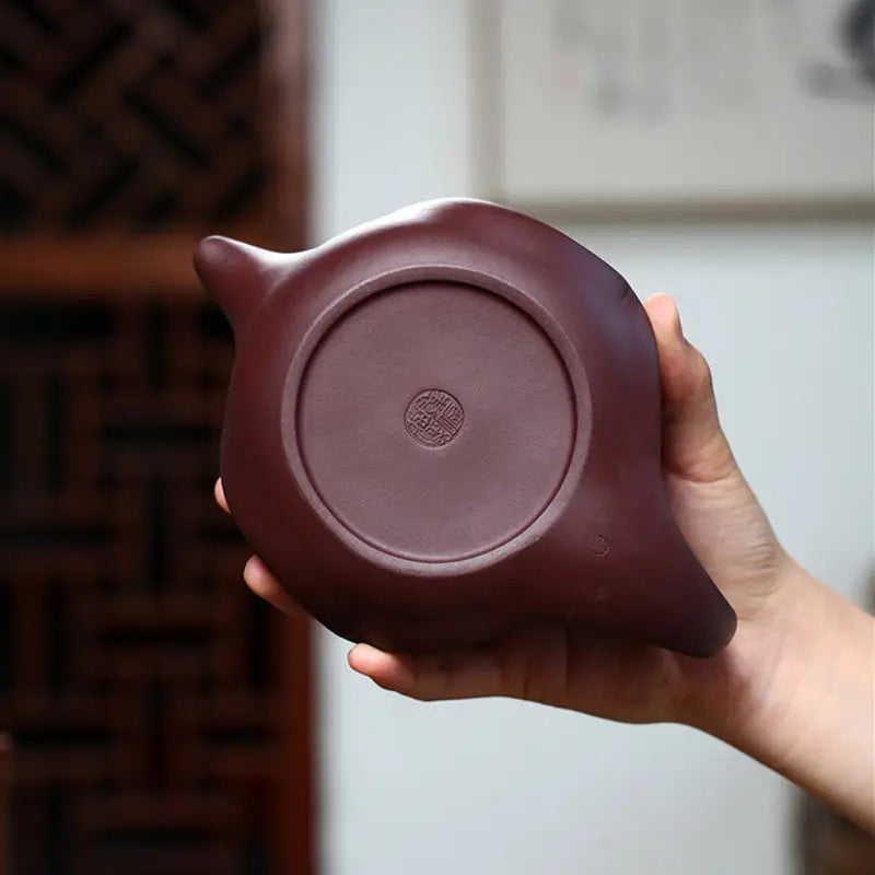 Maroon teapot base with circular stamp from Dragon Crest sculpted dragon Yixing Zisha 220ml teapot