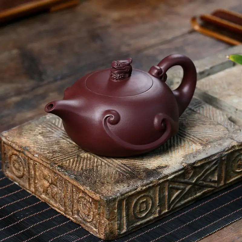 Maroon clay Dragon Crest teapot with swirling accents, sculpted dragon Yixing Zisha, 220ml crest teapot