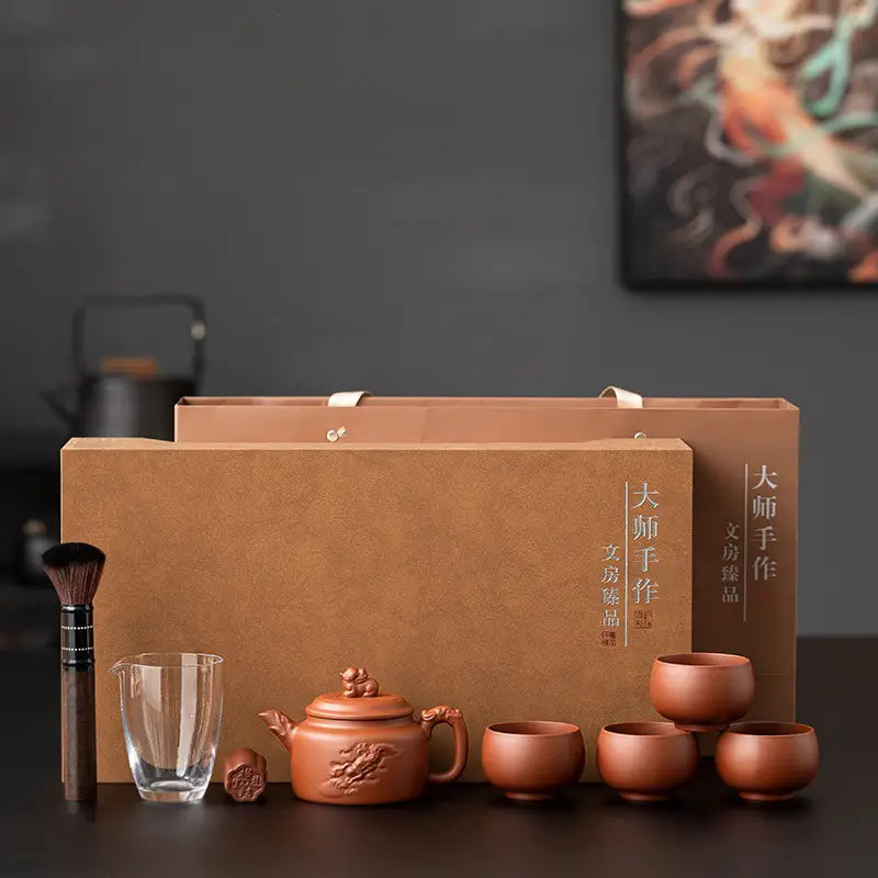 Dragon Guardian Tea Set with teaware set and brown boxes featuring Yixing Zisha clay