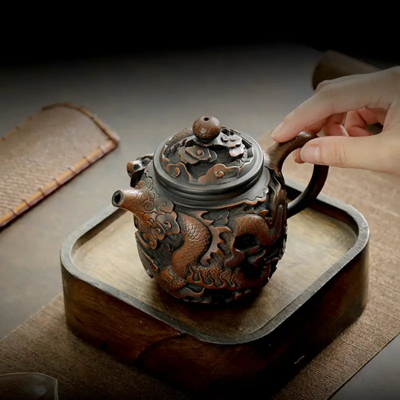 Ornate dragon-themed teapot from Dragon King II in Jianshui Zitao Jianshui pottery