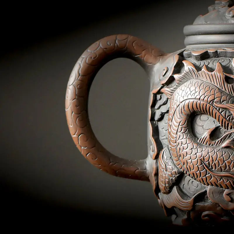 Ornate dragon-carved teapot from Dragon King II in Jianshui Zitao Jianshui pottery
