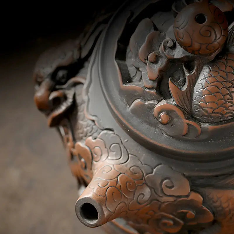 Ornate bronze Dragon King II teapot showcasing Jianshui Zitao Jianshui pottery craftsmanship