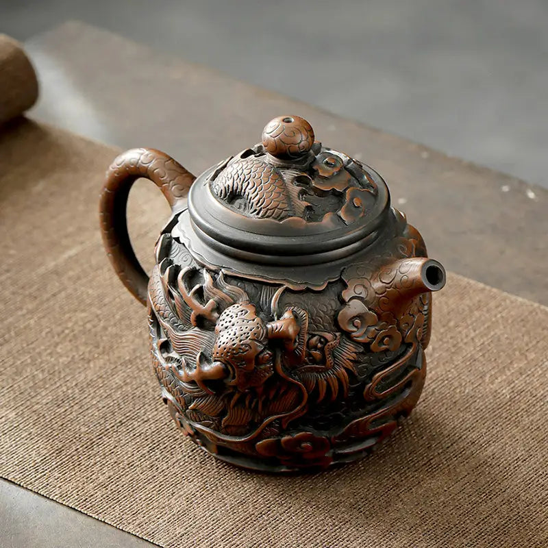 Ornate bronze dragon teapot from Dragon King II showcasing Jianshui Zitao pottery craftsmanship