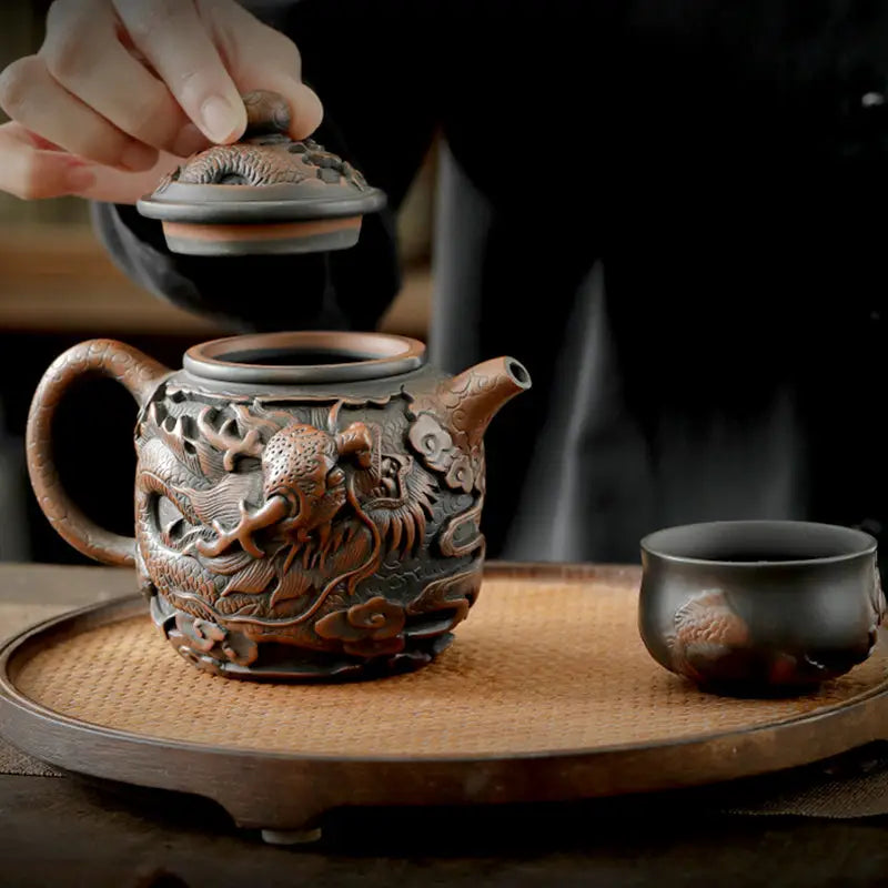 Ornate dragon-themed Jianshui Zitao teapot from Dragon King II Jianshui pottery collection