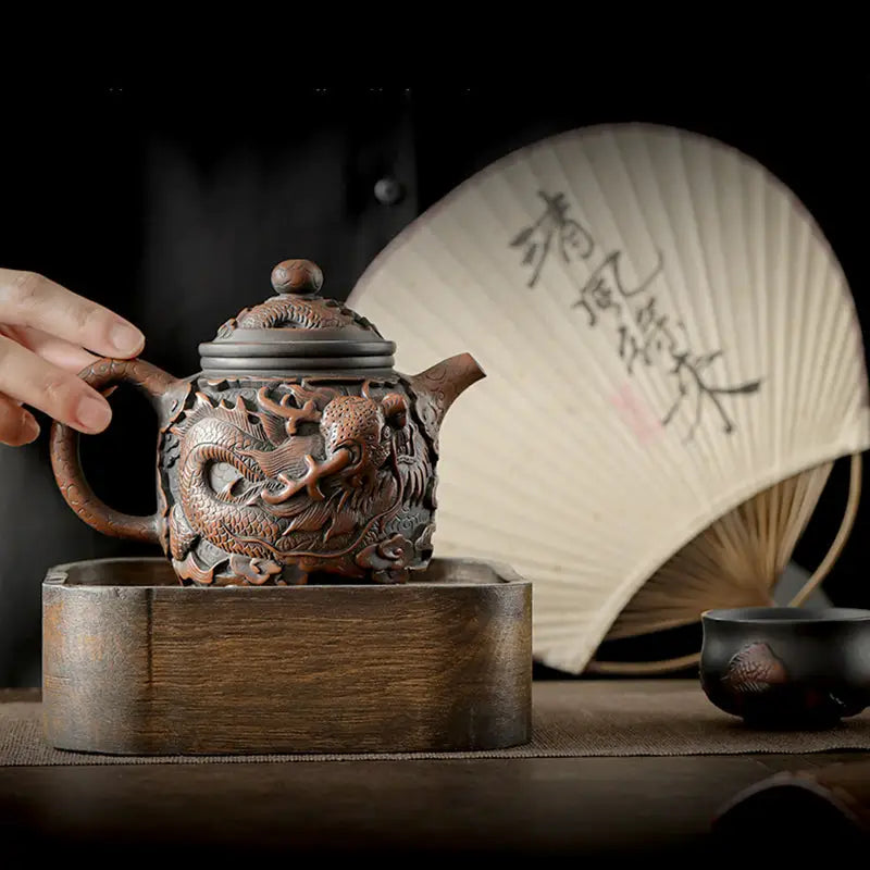 Dragon King II Jianshui Zitao dragon-carved brown teapot made of Jianshui pottery
