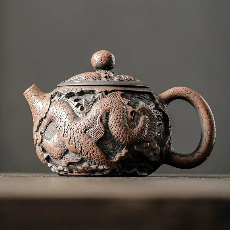 Ornate Dragon King teapot made from hand-carved Jianshui Zitao clay with dragon symbolism