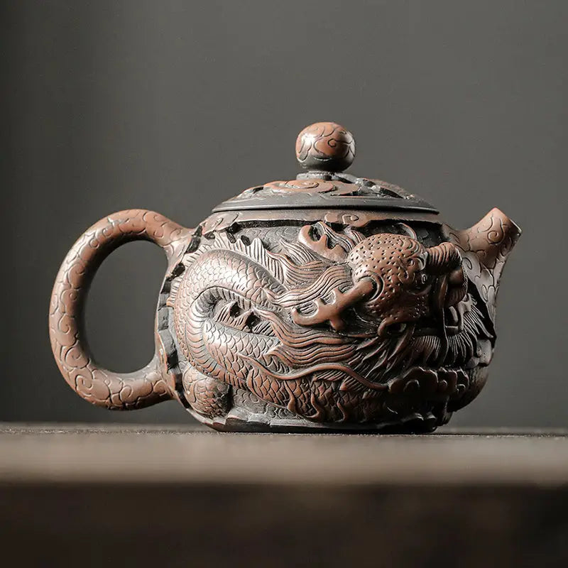Ornate Dragon King teapot crafted from hand-carved Jianshui Zitao clay with dragon symbolism