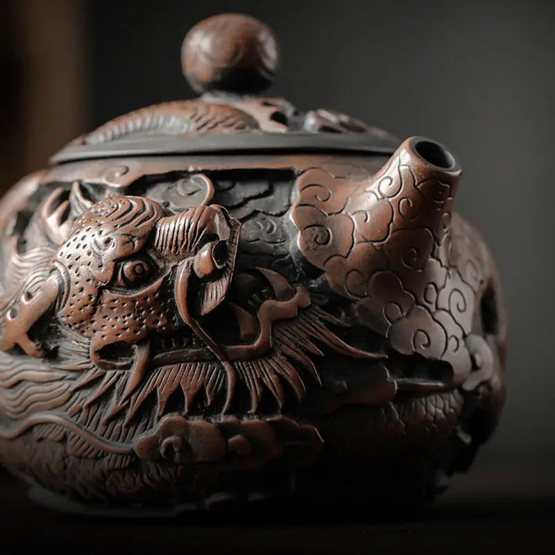 Ornate dragon-themed teapot made from hand-carved Jianshui Zitao clay showcasing dragon symbolism