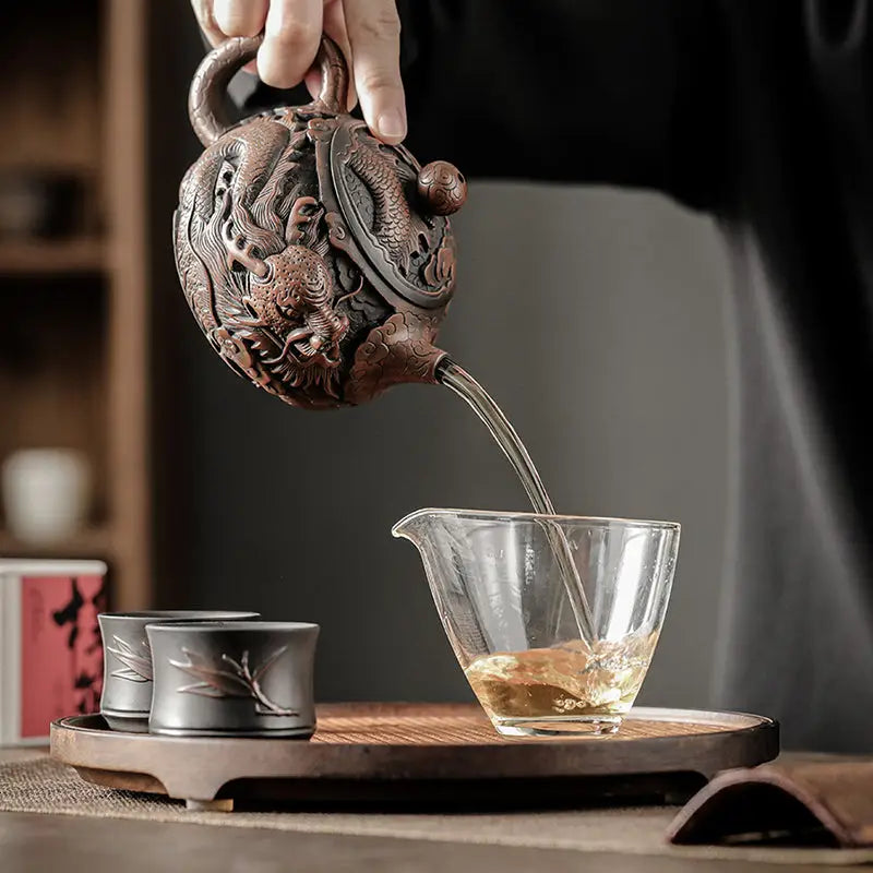 Dragon King teapot showcasing dragon symbolism in hand-carved Jianshui Zitao clay