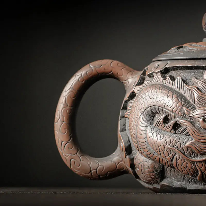 Ornate Dragon King teapot made from hand-carved Jianshui Zitao clay featuring dragon symbolism