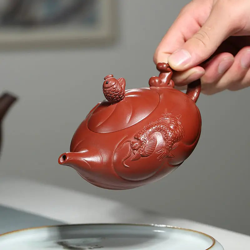 Reddish-brown Yixing Zisha Clay Teapot with dragon and carp ascending koi fish details