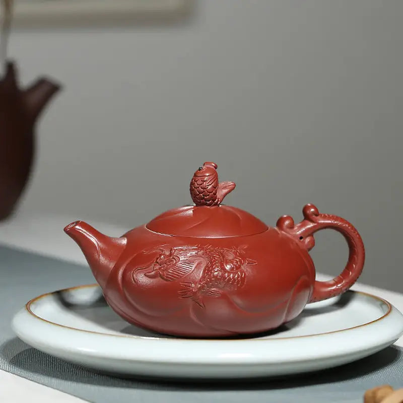 Reddish-brown Yixing Zisha clay teapot with dragon and carp ascending design for Dragon & Koi Fish