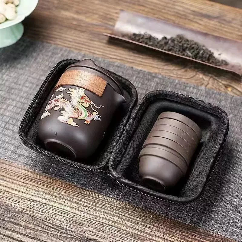 Dragon and phoenix Zisha travel tea set packed in its fitted case