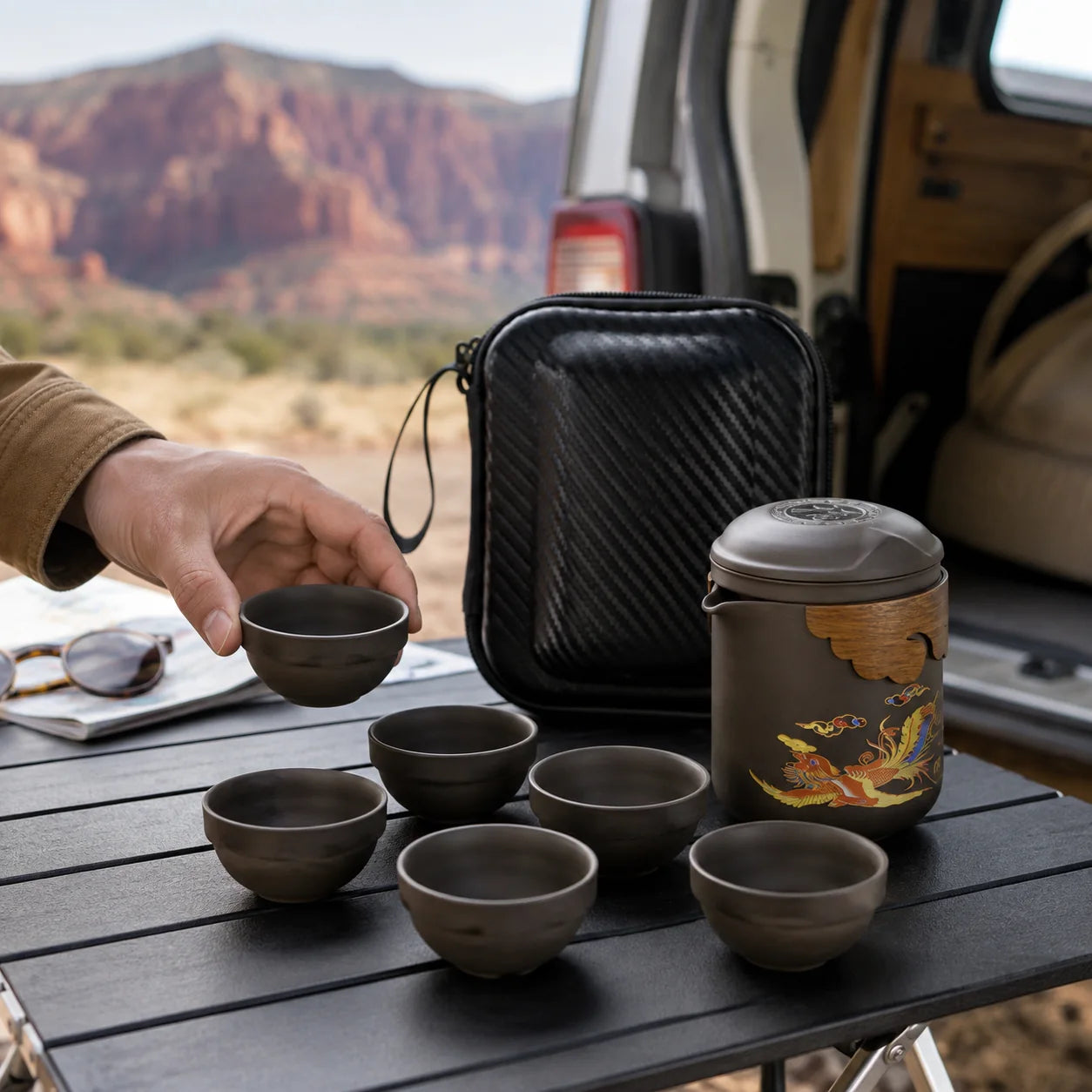 One-teapot six-cup Zisha travel tea set on a road trip