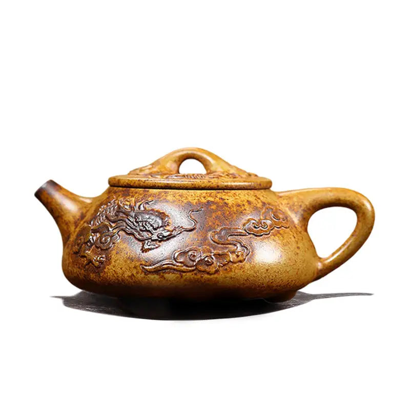 Ornate brown Yixing teapot with dragon carvings in Duanni clay from Dragon Root collection