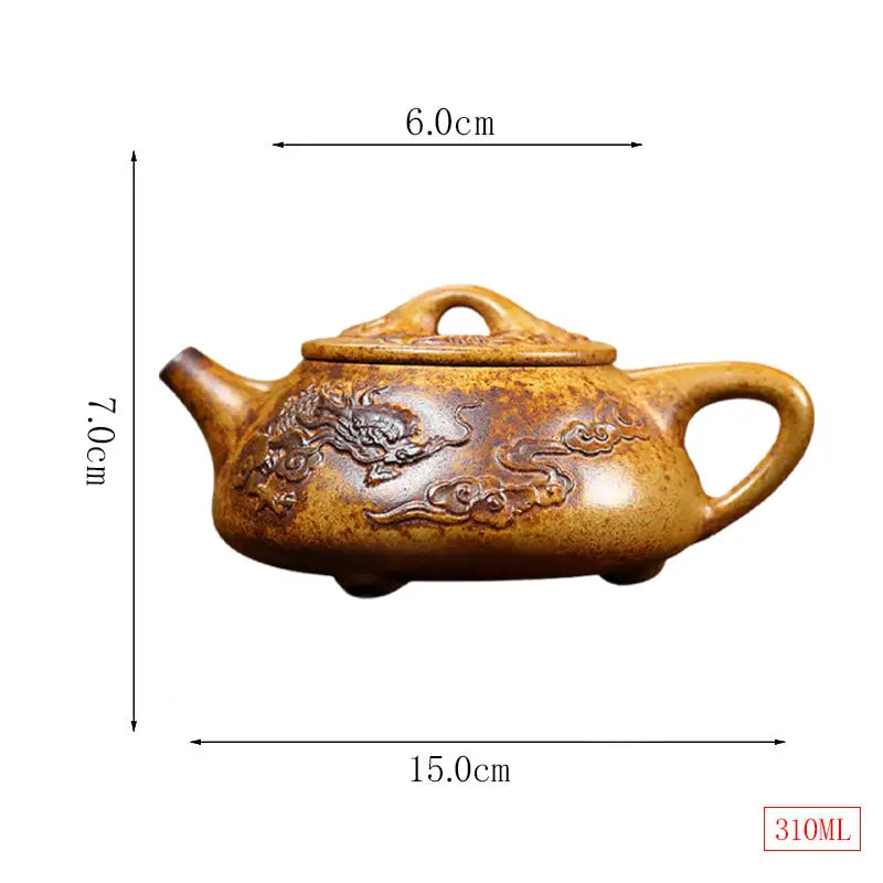 Brown ceramic Yixing teapot with intricate dragon carvings made from Duanni clay