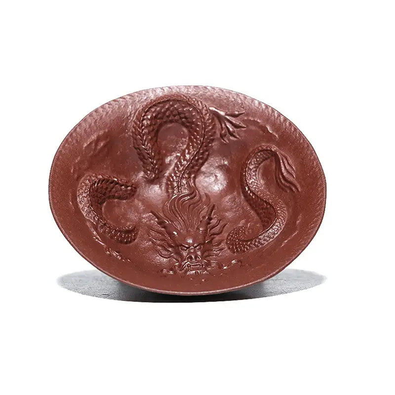 Brown oval plate with dragon relief from Dragon Spirit teacup collection