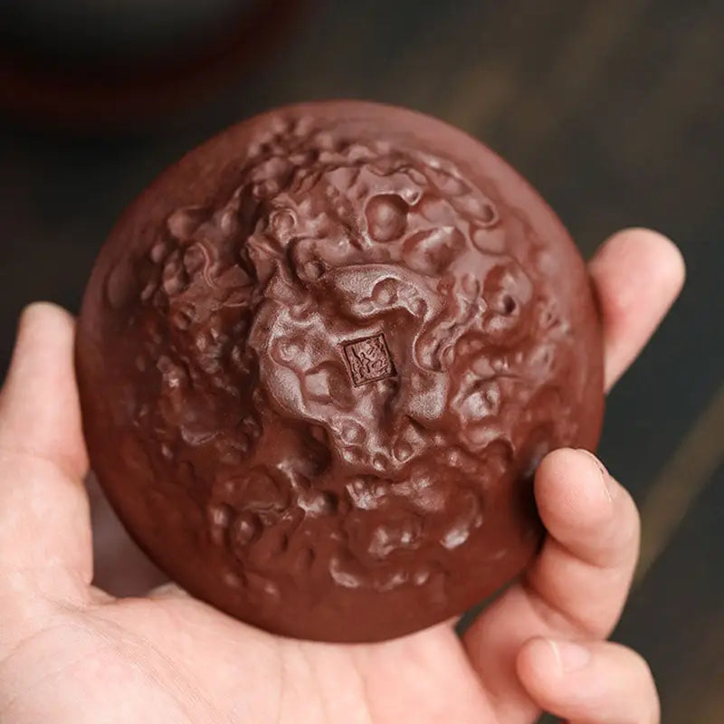 Textured brown ceramic Dragon Spirit teacup for a unique spirit teacup experience